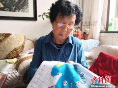 澳门永利网投甘肃八旬老人绣22米《清明上河图》 一针一线“